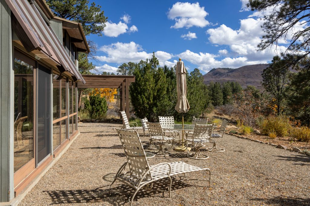 The patio area looks out across a private valley.