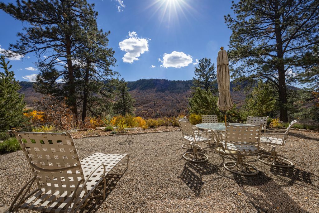 The patio area looks out across a private valley.